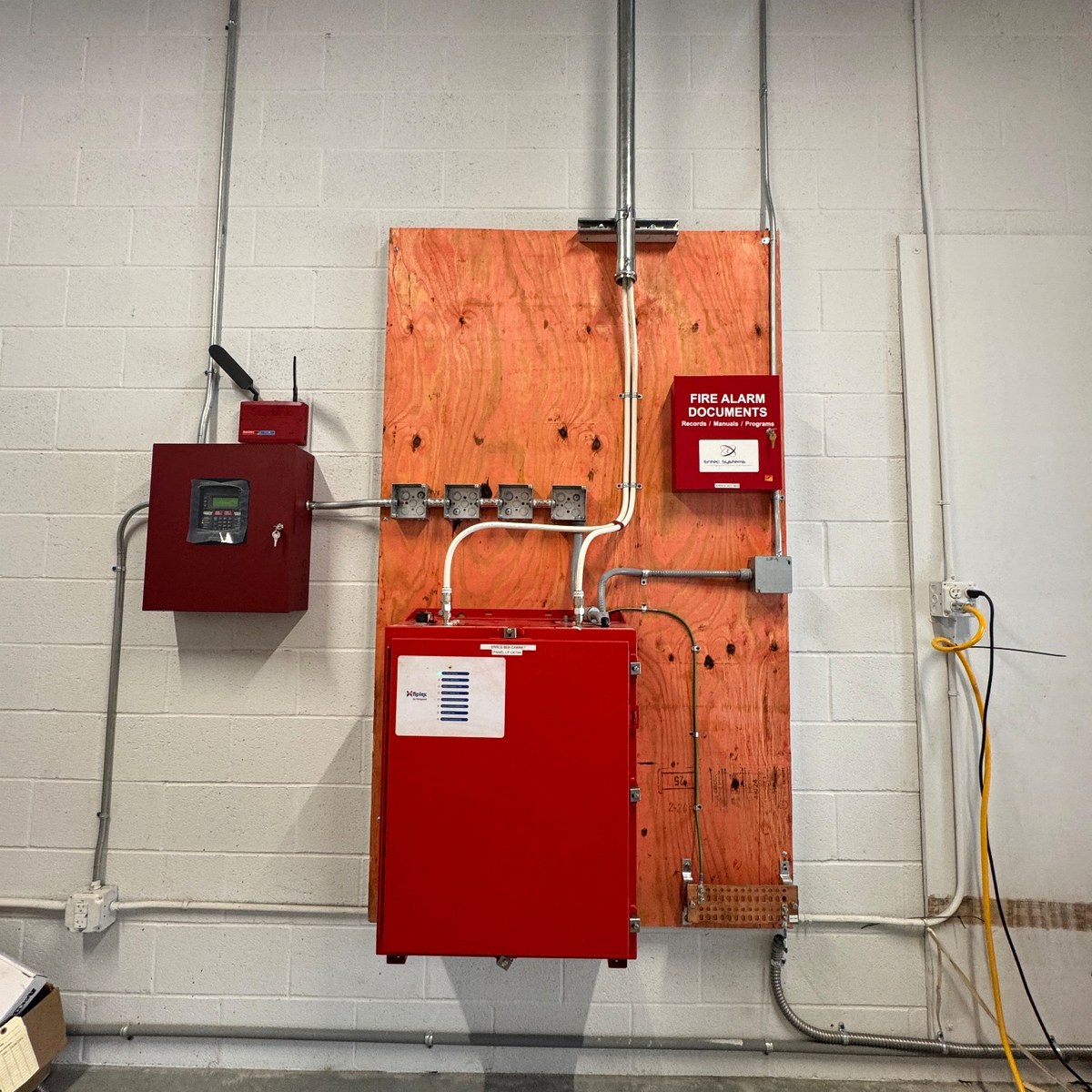 ERCES BDA cabinet and fire alarm interface in warehouse