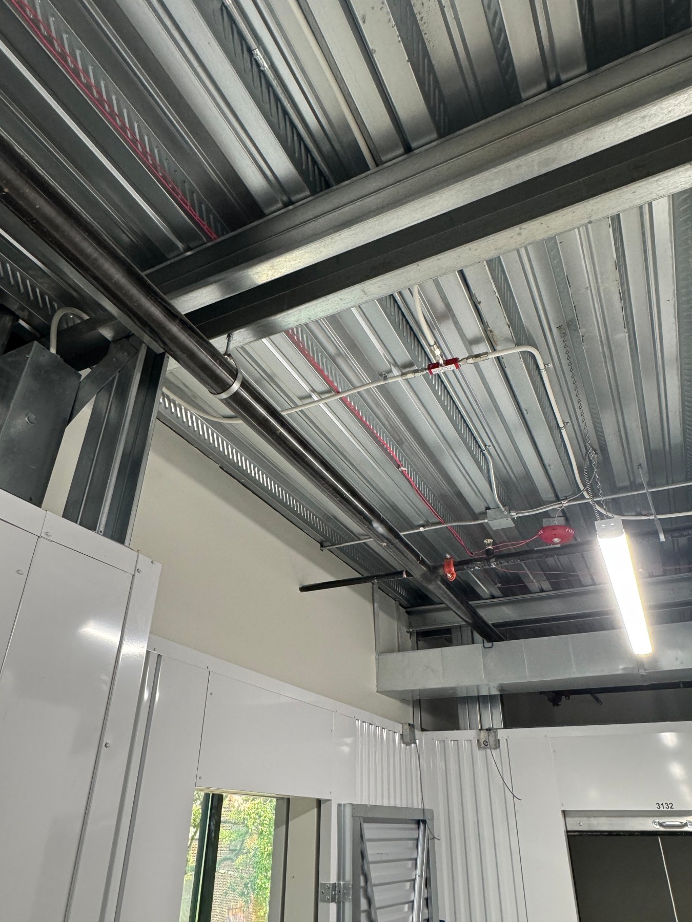 Overhead public safety DAS coax pathway and antenna routing