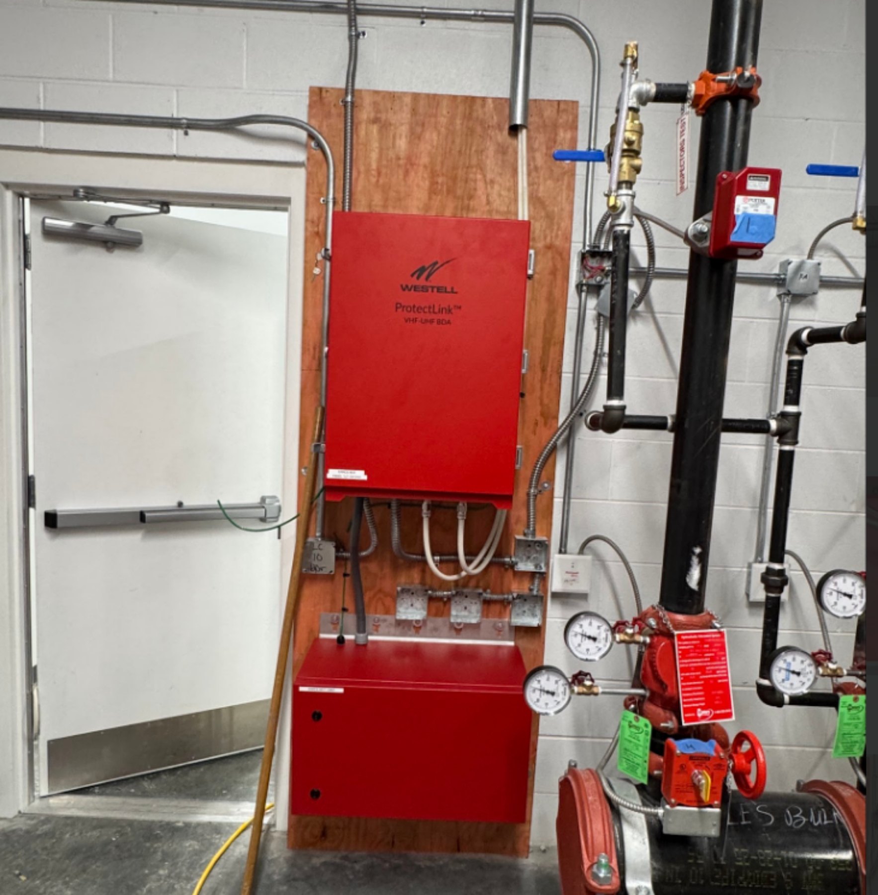 Westell public safety BDA mounted in equipment room